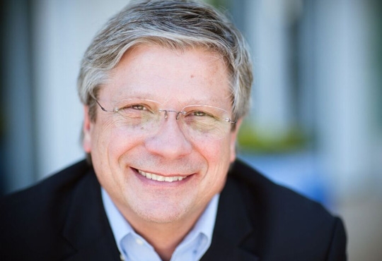 Warren Neuburger, CIO and EVP, PGi 